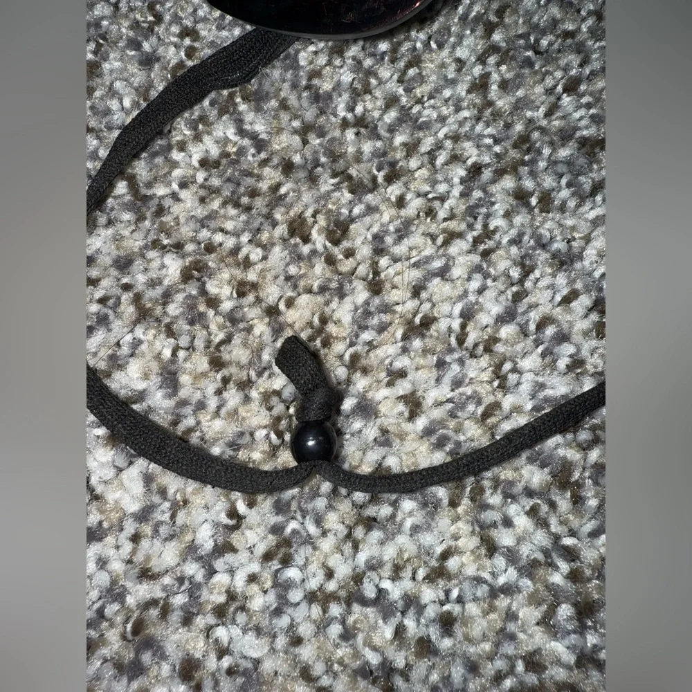 Red sunglasses with neck strap